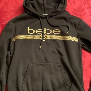Bebe Sport black ladies Medium hooded sweatshirt with gold writing